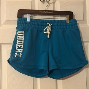 Under Armour blue and white women shorts
Size lg